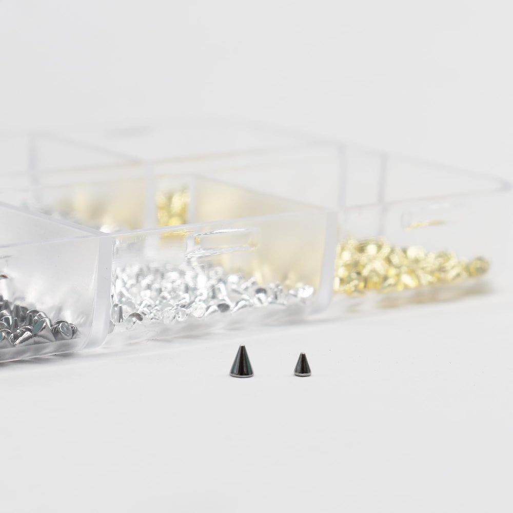 Ganepwns studs used with edgy outfit showing coordinated accessory styling benefit