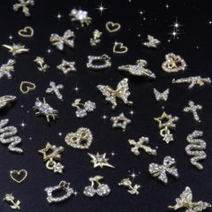 Ganepwns lifestyle manicure with charms illustrating a finished glamorous look