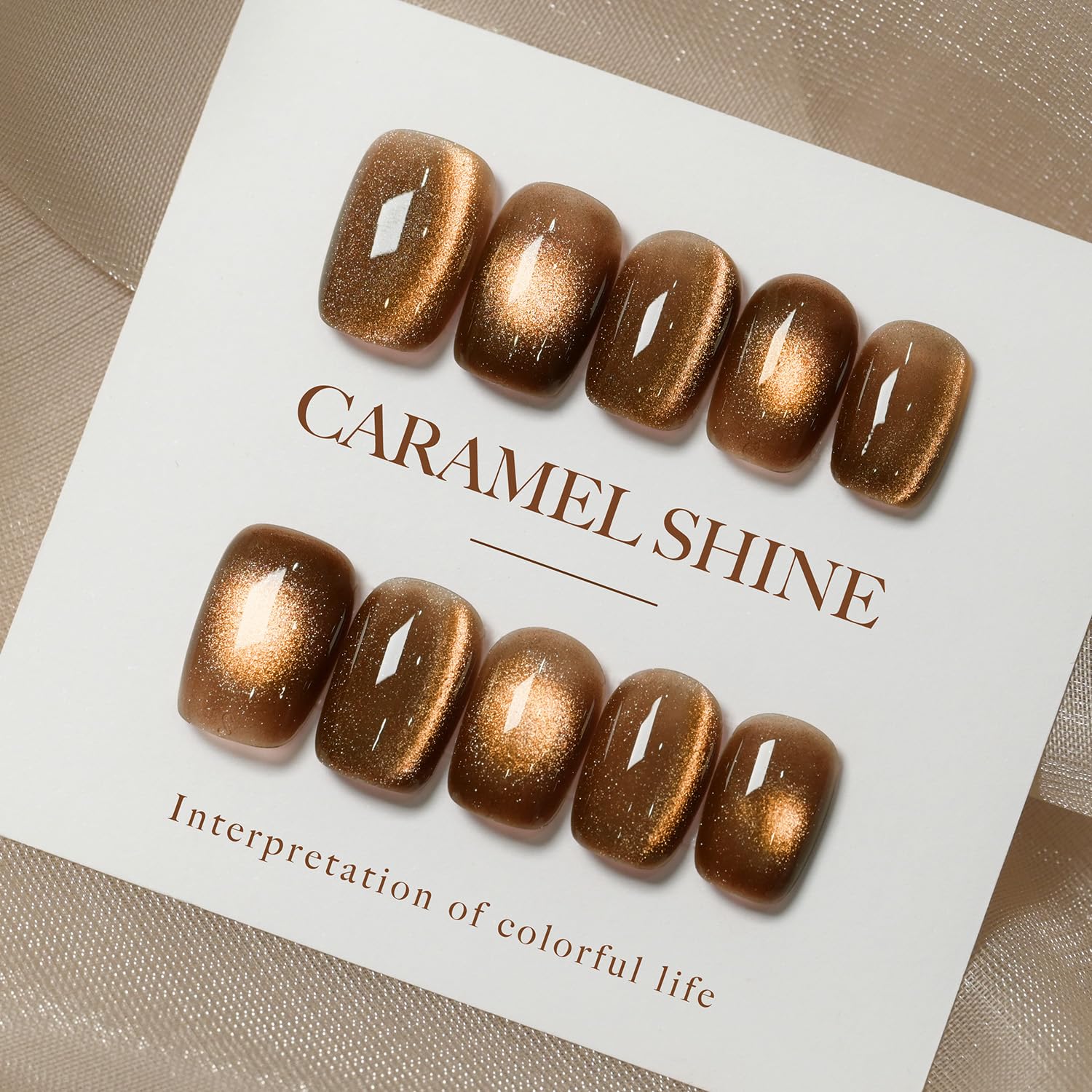 GAOY finished manicure on model hands showcasing wearable caramel shimmer