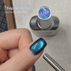 GAOY magnet held over nail demonstrating cat-eye band effect benefit