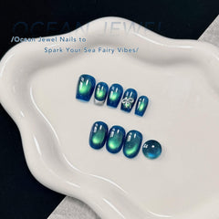 GAOY single nail swatch displaying blue-green cat-eye stripe and holographic shine for inspiration