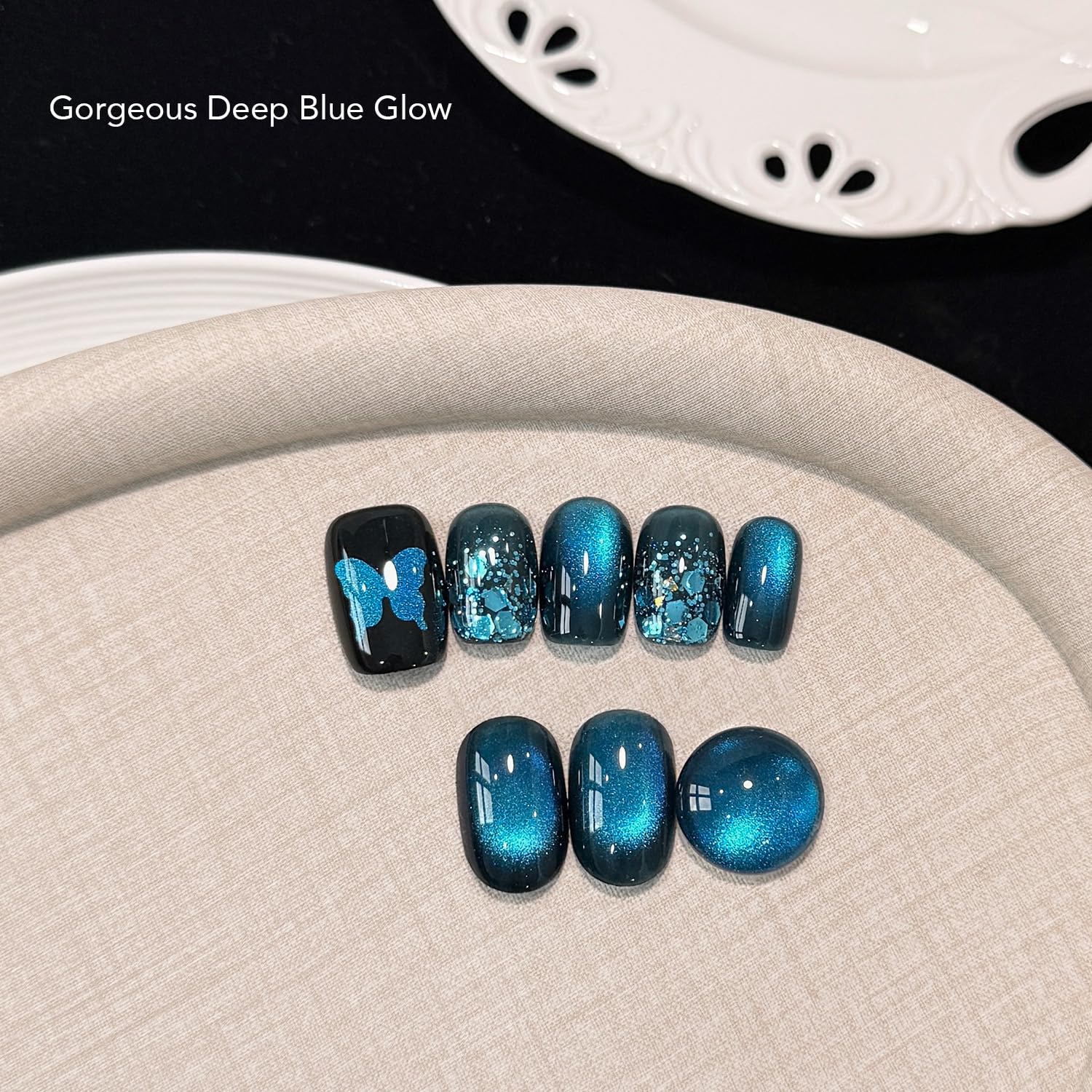 GAOY magnet held above wet nail creating cat-eye stripe for dramatic effect