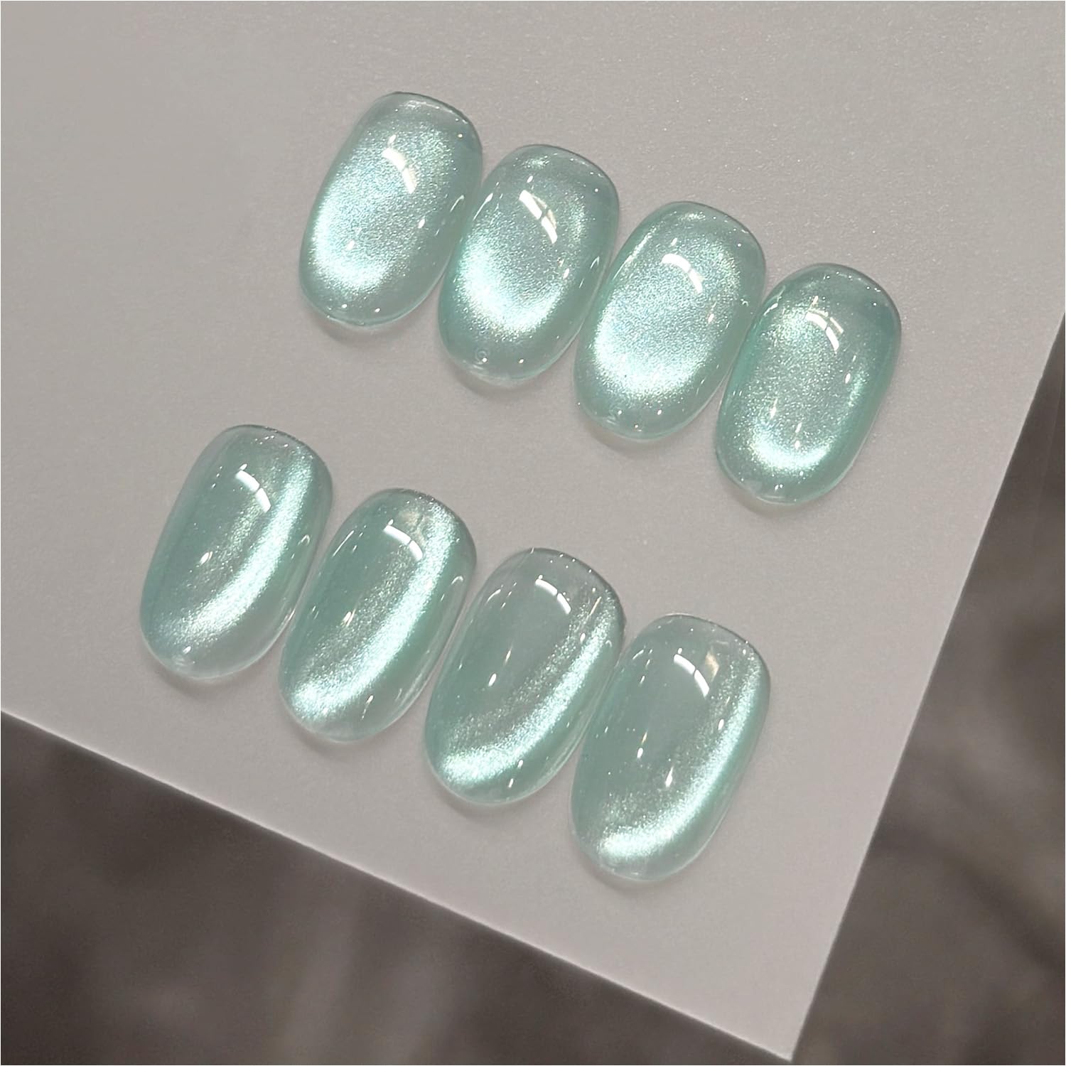 GAOY front bottle Moon Pool showing holographic blue shimmer benefit: clear shade view