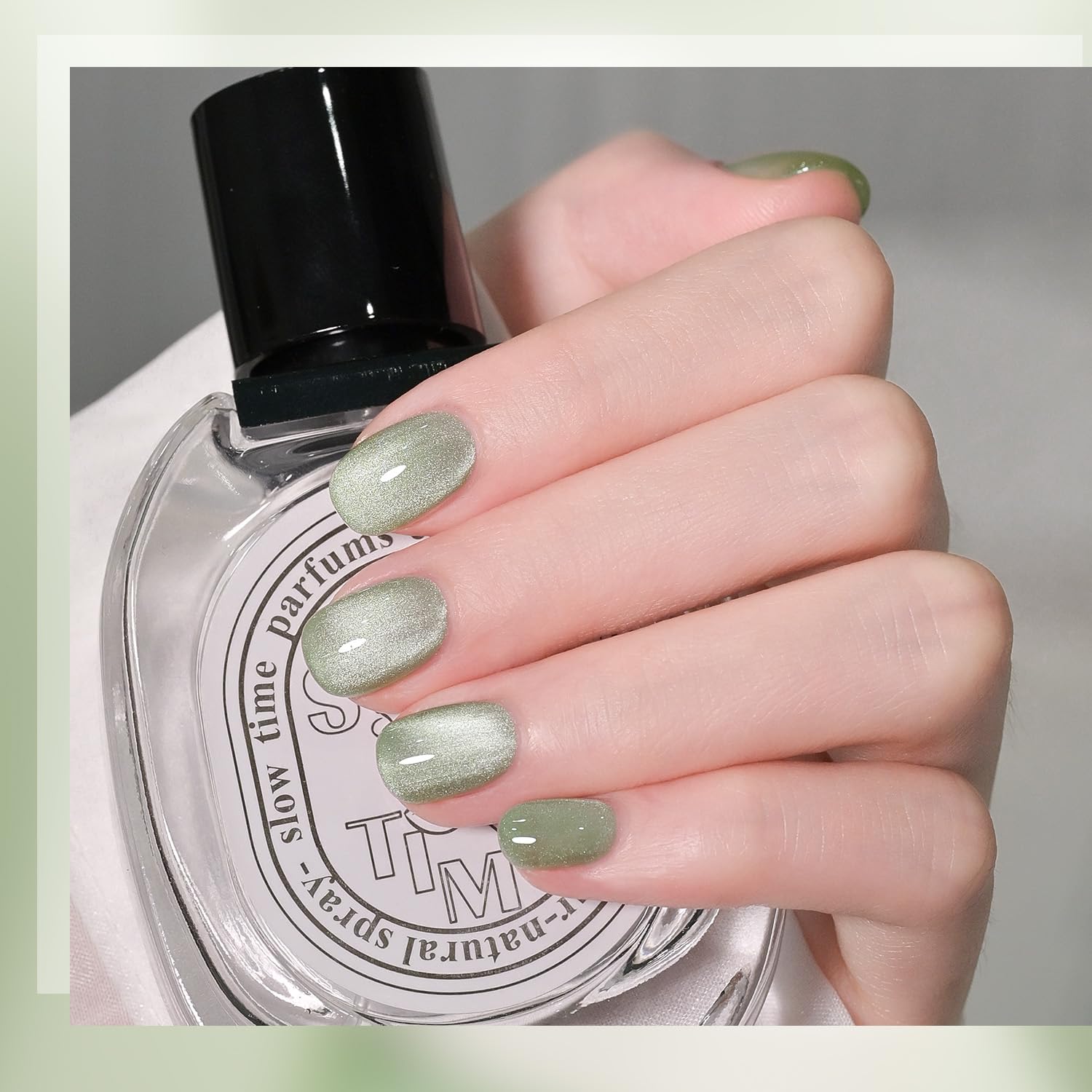GAOY manicure on hand displaying green jade finish and long-lasting glossy look