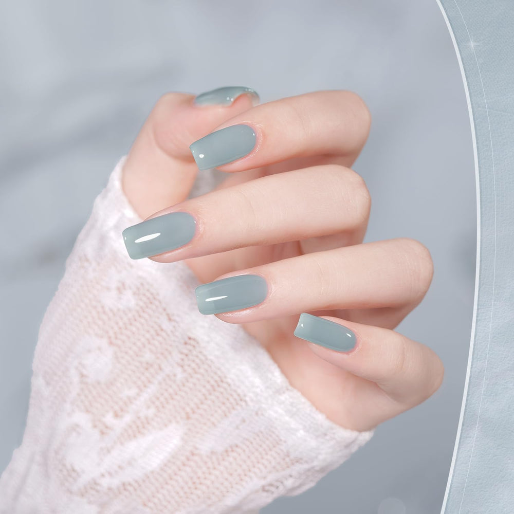 GAOY model hand with cured sheer pink layers showing glossy salon-quality result