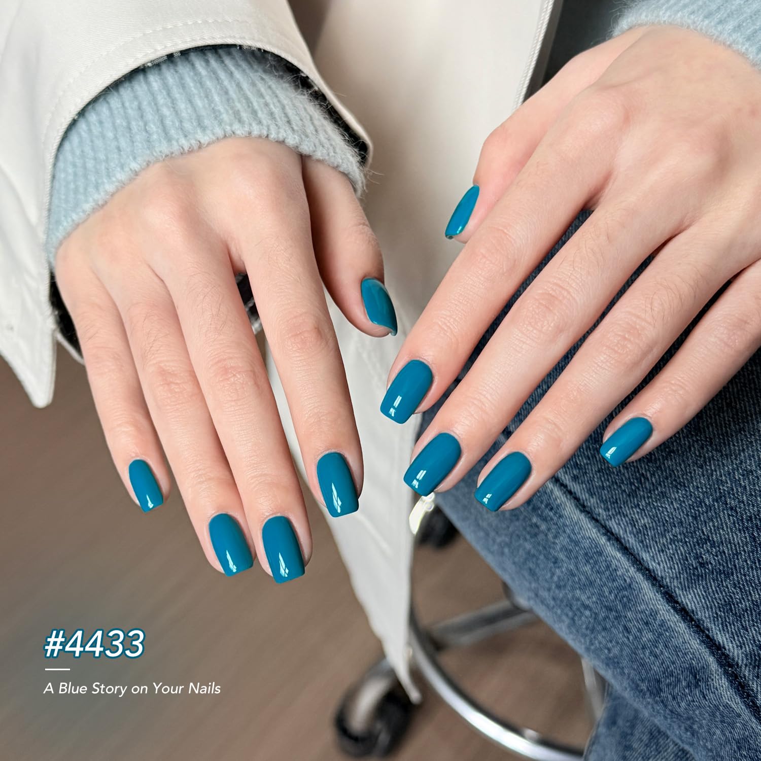 GAOY manicured hands displaying navy-to-light-blue ombre benefit