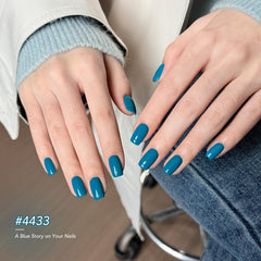 GAOY manicured hands displaying navy-to-light-blue ombre benefit