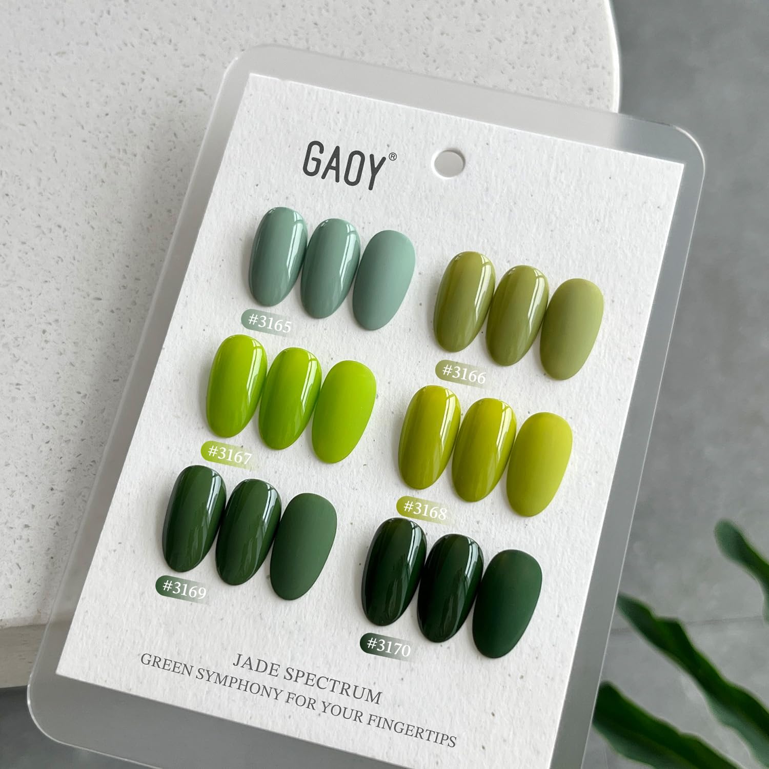 GAOY bottle next to coin size comparison showing compact travel-friendly benefit