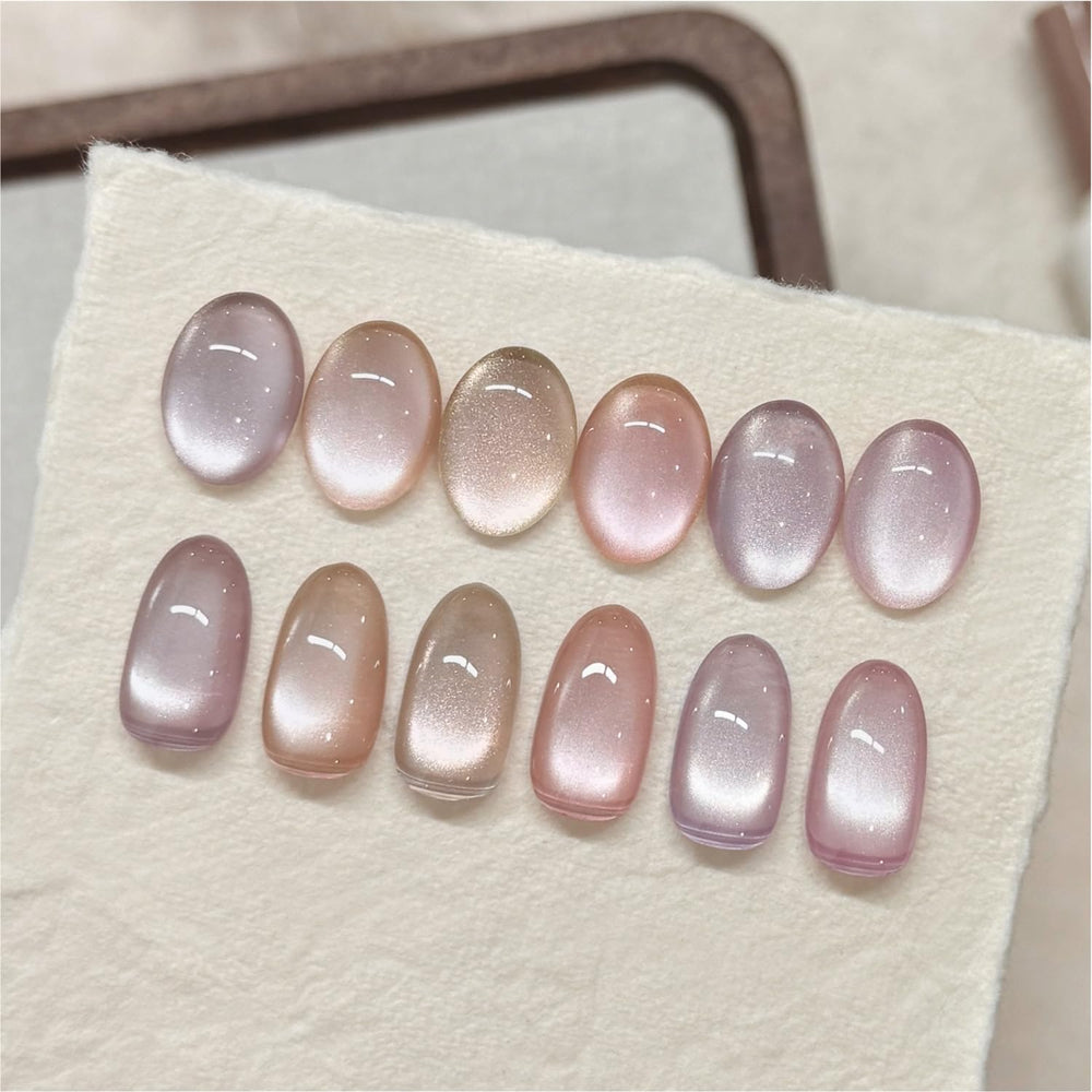 GAOY finished manicure on model showing peachy nude cat-eye look and wearable elegance