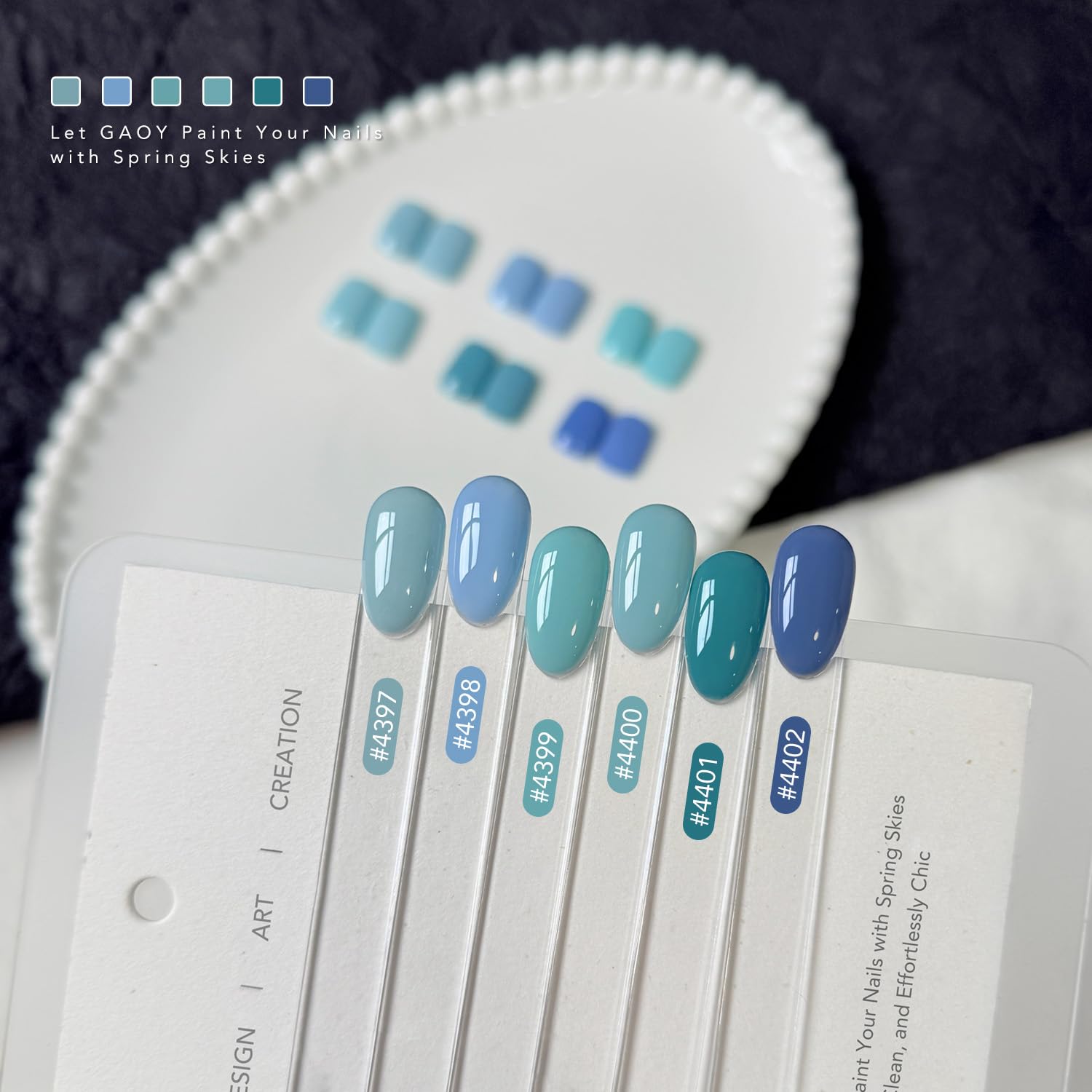 GAOY nail art on salon table showcasing versatile blue shades and styling