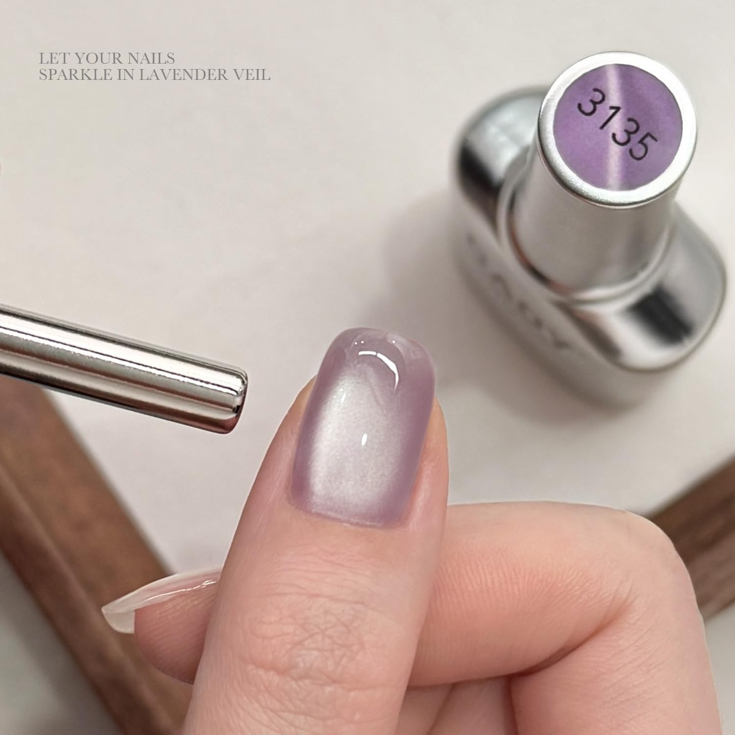 GAOY magnet held over nail forming cat eye stripe for easy pattern creation