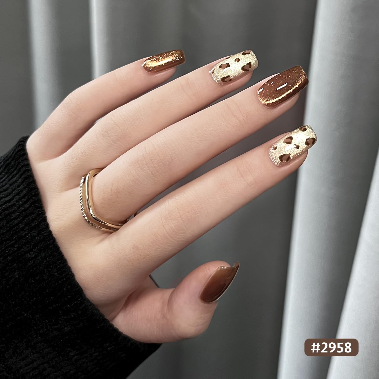 GAOY finished manicure on hand model showing holographic shine for long-lasting beauty