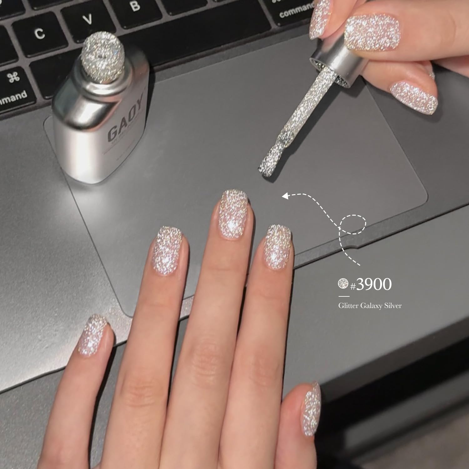 GAOY nail swatch on hand model displaying cured glitter shine and durability