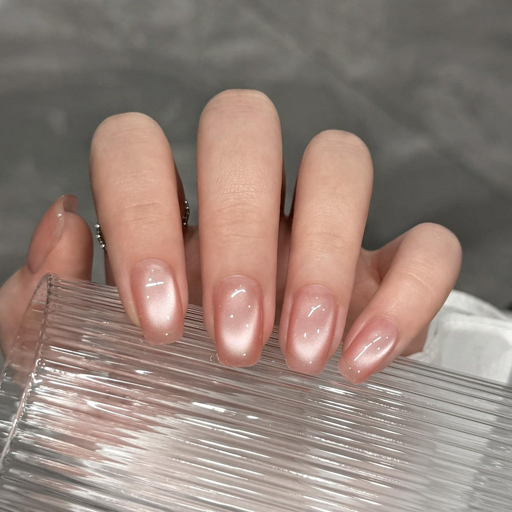 GAOY swatches on fingers showing faded coral holographic shift for color reference