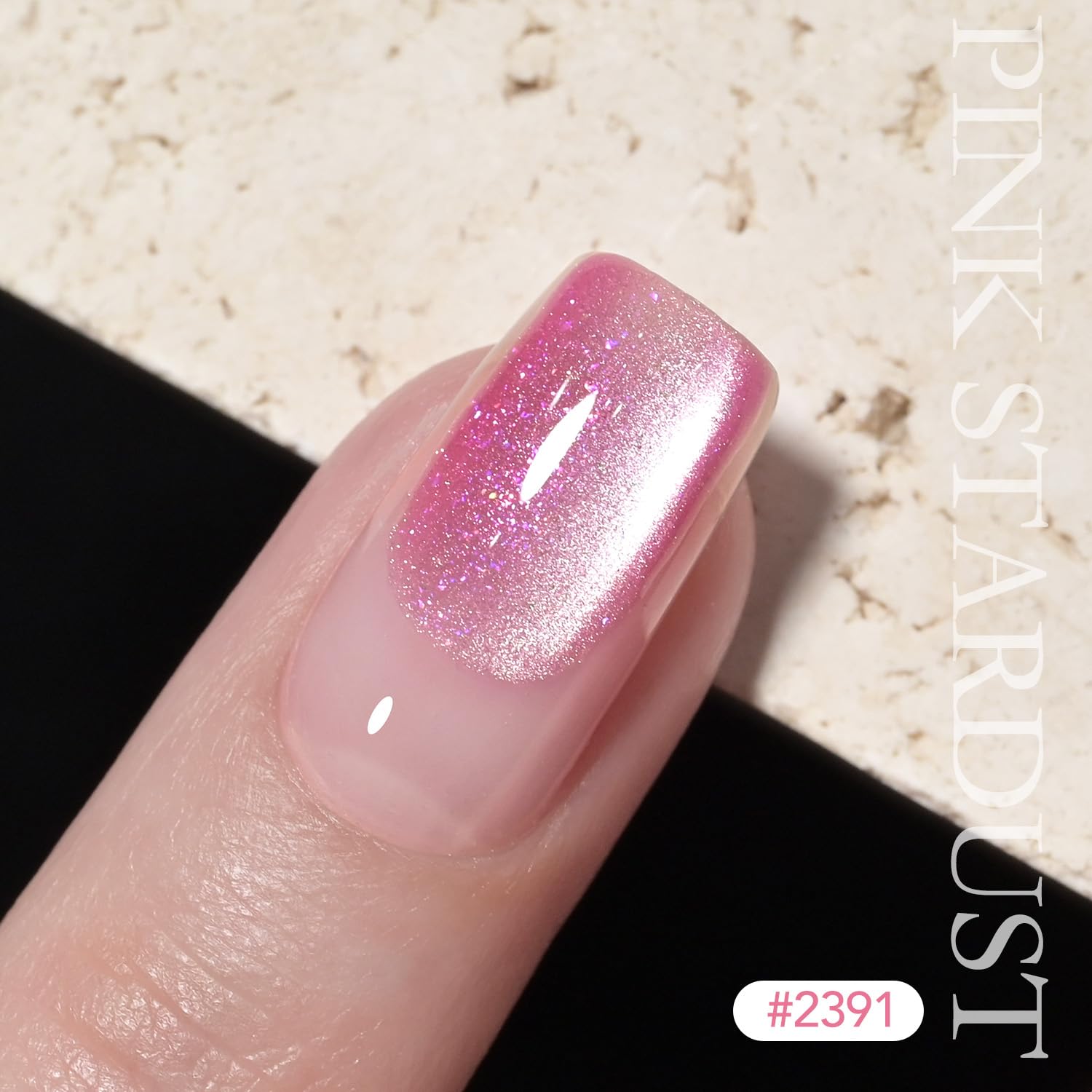 GAOY finished manicure on model showing pink stardust shine for standout nails