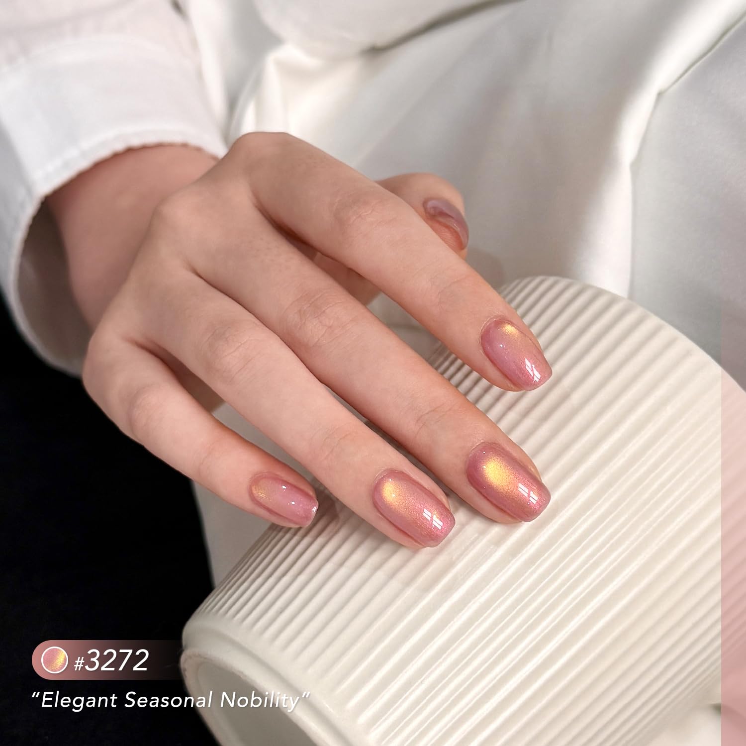 GAOY finished manicure on hands in lifestyle setting, showcasing long-lasting glossy sparkle