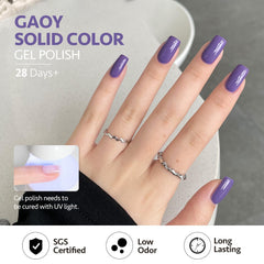 GAOY manicured hand wearing purple glitter polish in lifestyle setting, showcases finished look