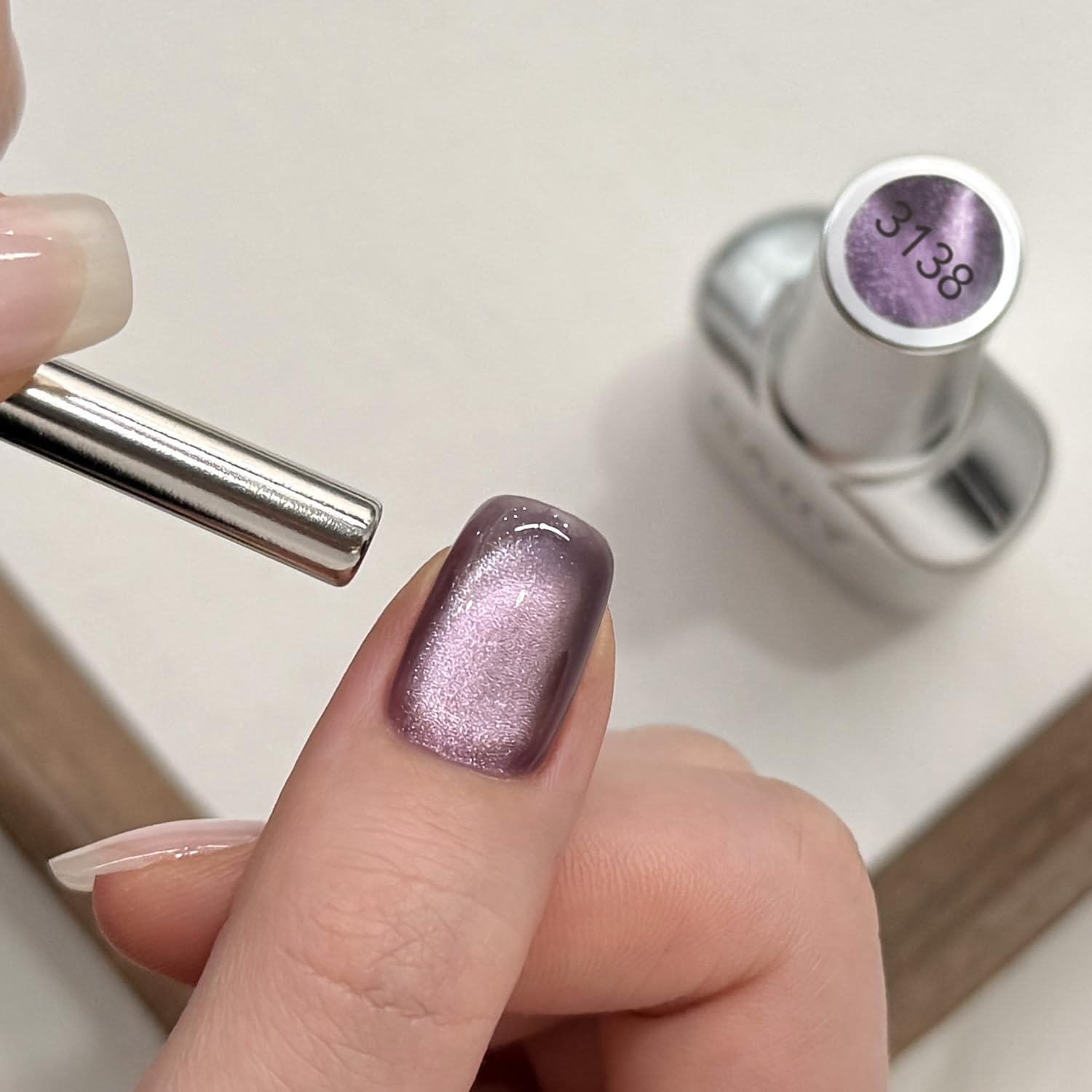 GAOY gel polish texture close-up on brush, highlighting glitter responsiveness