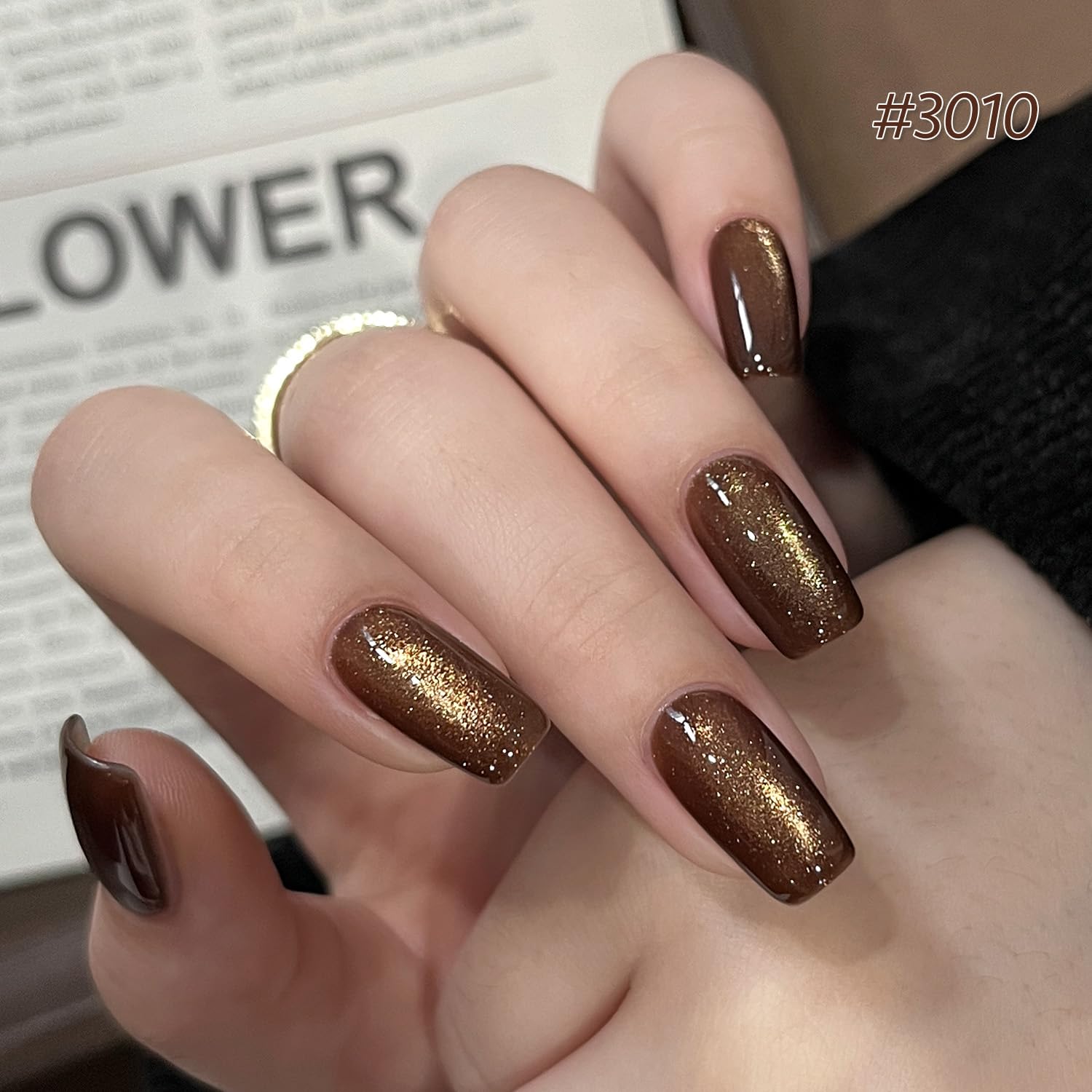 GAOY swatch close-up revealing caramel amber glitter texture and shimmer, visible sparkle benefit