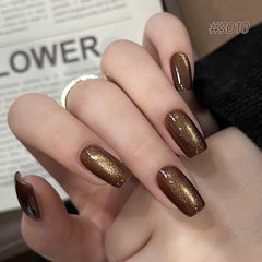 GAOY swatch close-up revealing caramel amber glitter texture and shimmer, visible sparkle benefit