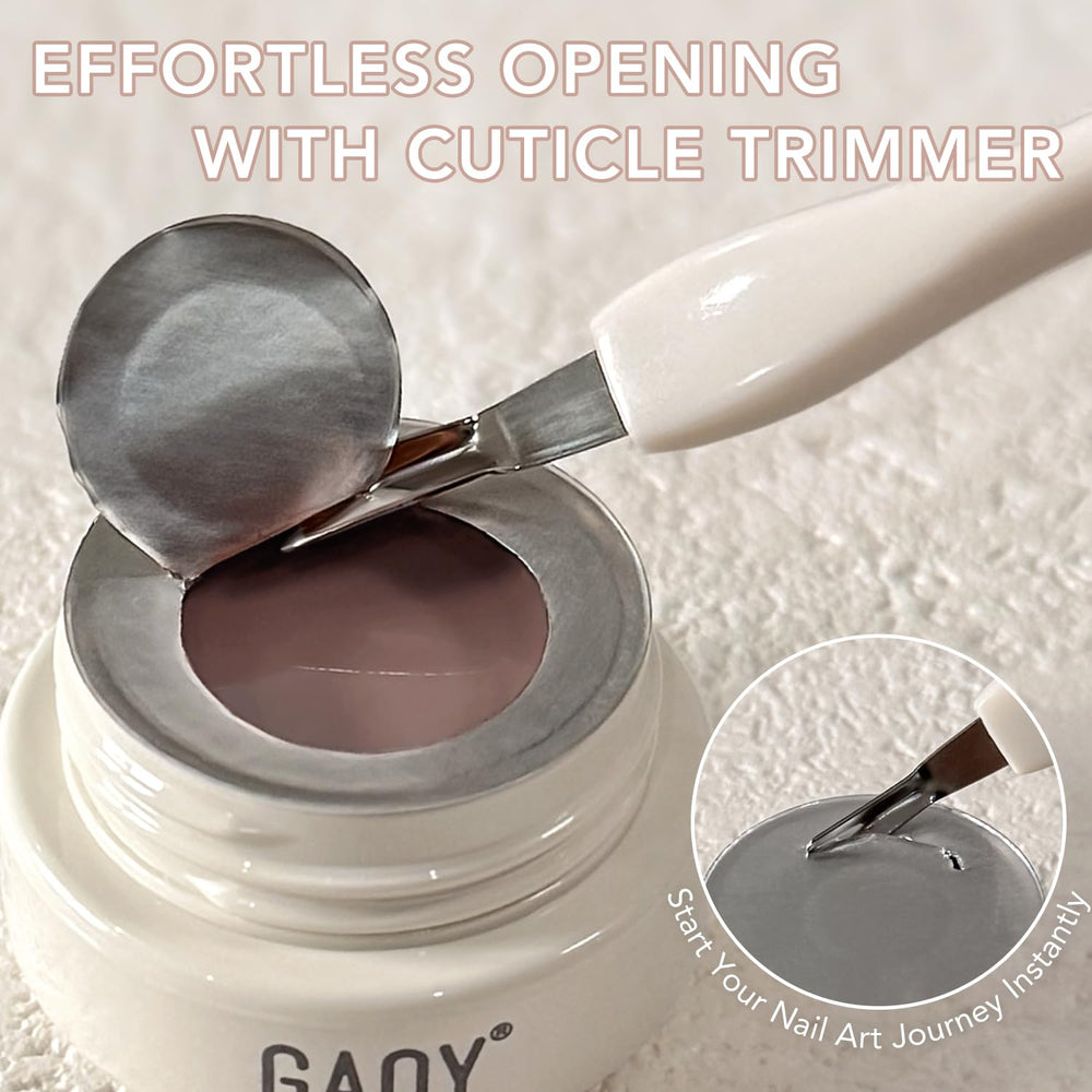 GAOY included brush and cuticle trimmer arranged beside open gel pot