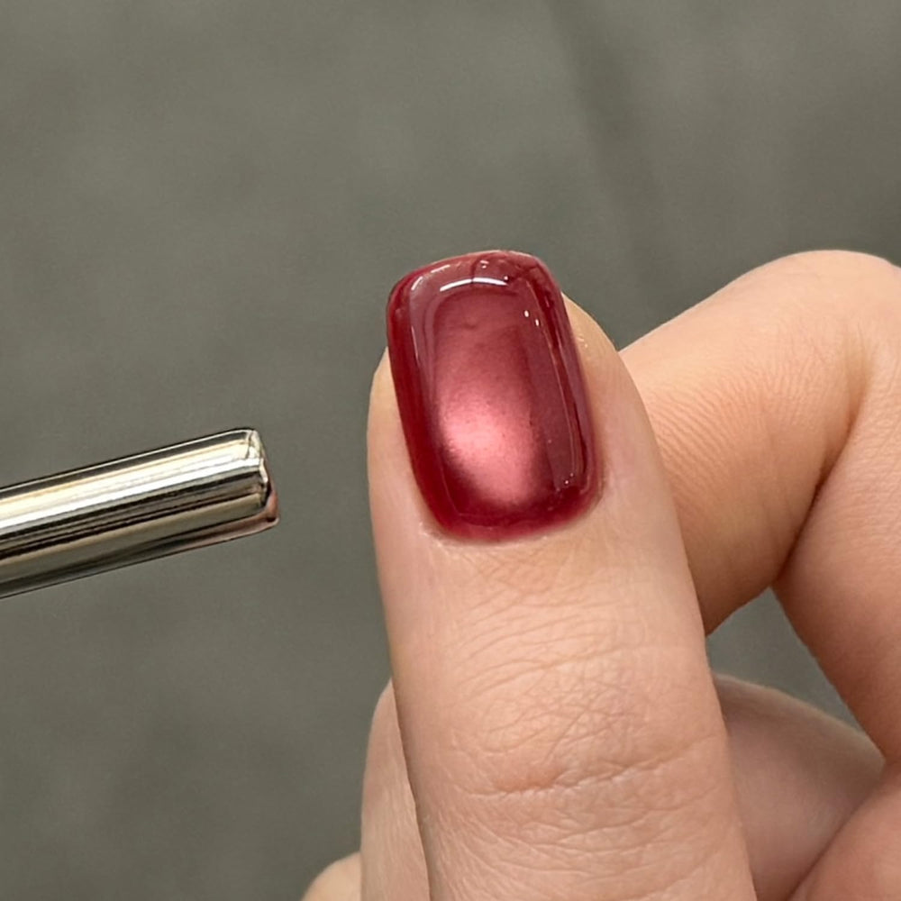 GAOY magnet held near wet polish demonstrating cat-eye effect for precise pattern control
