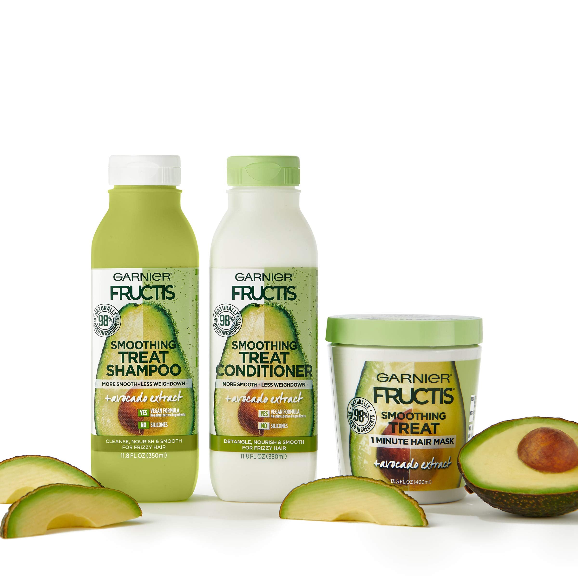 Garnier Fructis applying conditioner to mid-lengths and ends for smoothing