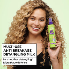 Garnier Fructis before and after curly hair showing reduced knots