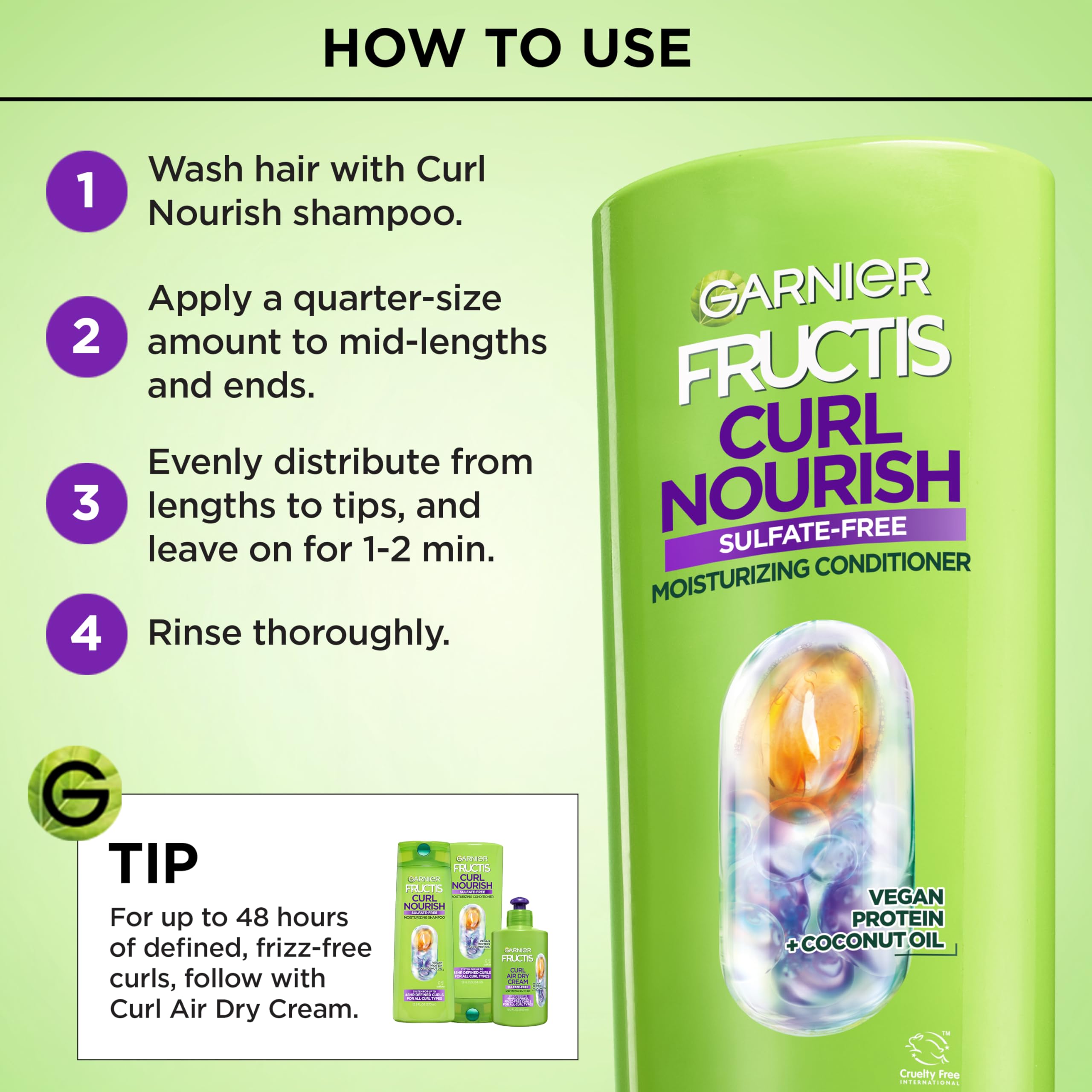 Garnier Fructis being applied to wet curls for improved detangling