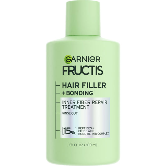 Garnier Fructis front packaging showing product benefits for stronger hair