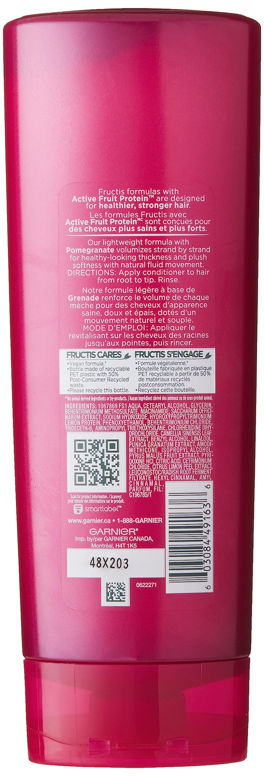 Garnier Fructis conditioner applied in hair demonstrating lightweight volumizing effect and softer texture