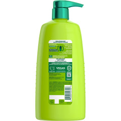 Garnier Fructis close-up of pump and ingredients highlighting strengthening benefits