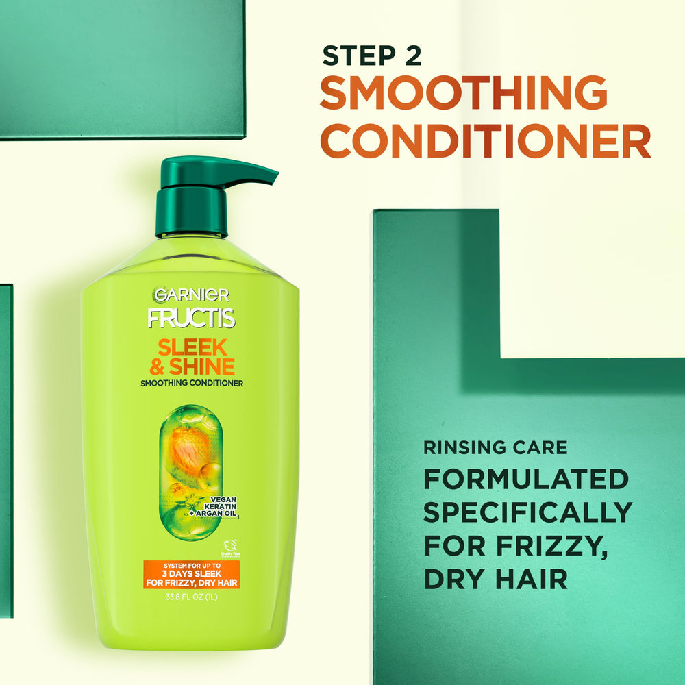 Garnier Fructis label close-up with ingredients and cleaner formulation benefit