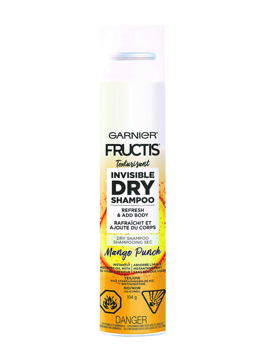Garnier Fructis nozzle close-up illustrating even invisible spray benefit