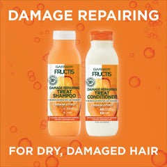 Garnier Fructis creamy conditioner texture dispensed for easy application