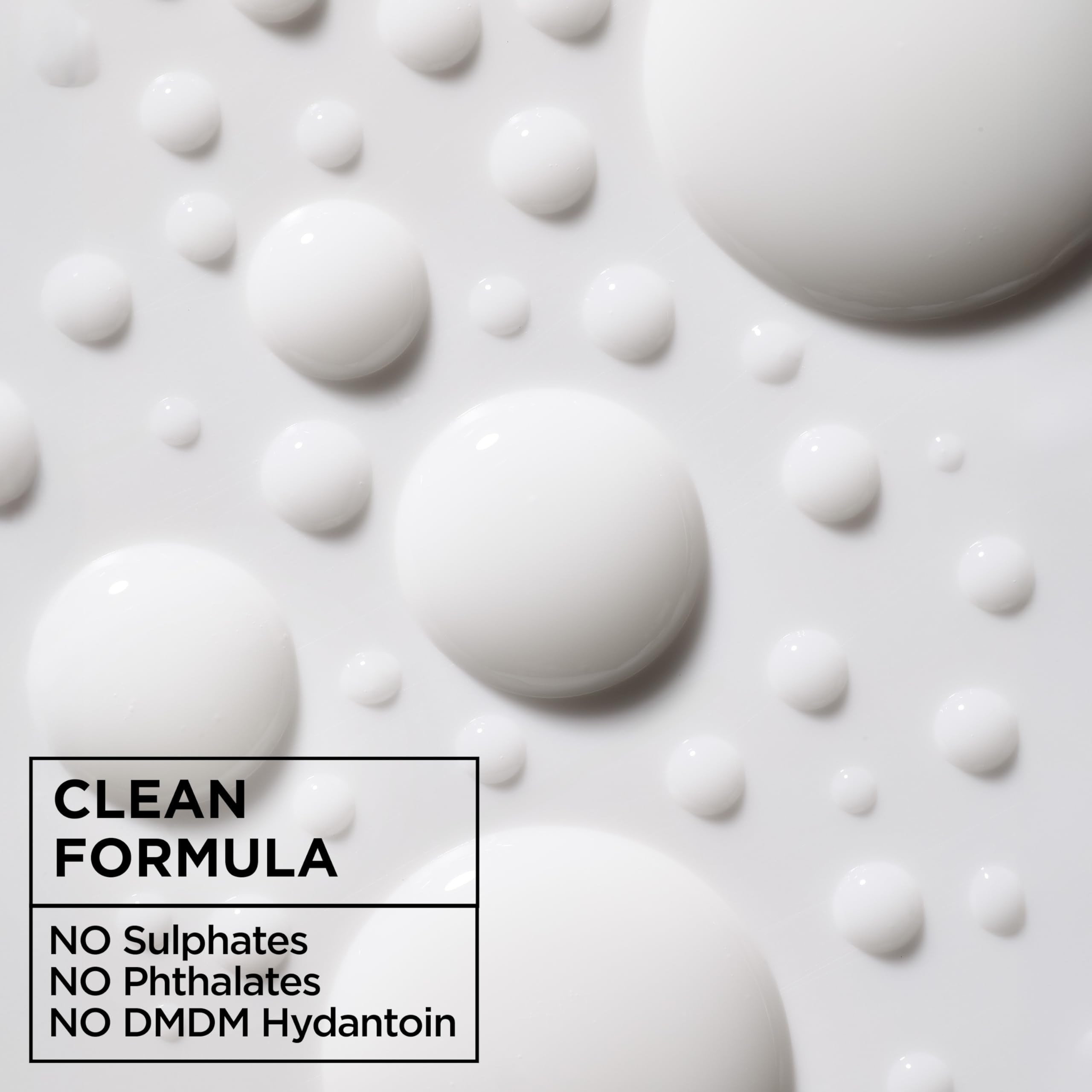 Garnier Fructis close-up of milk texture demonstrating lightweight slip