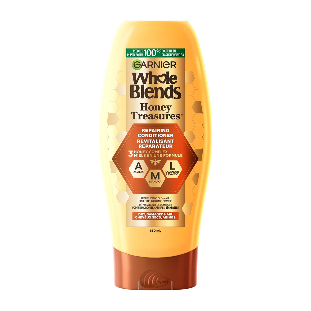 Garnier bottle front view showing Honey Treasures label and restorative benefit