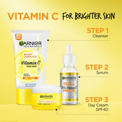 Garnier tube in hand for scale showing compact portable size