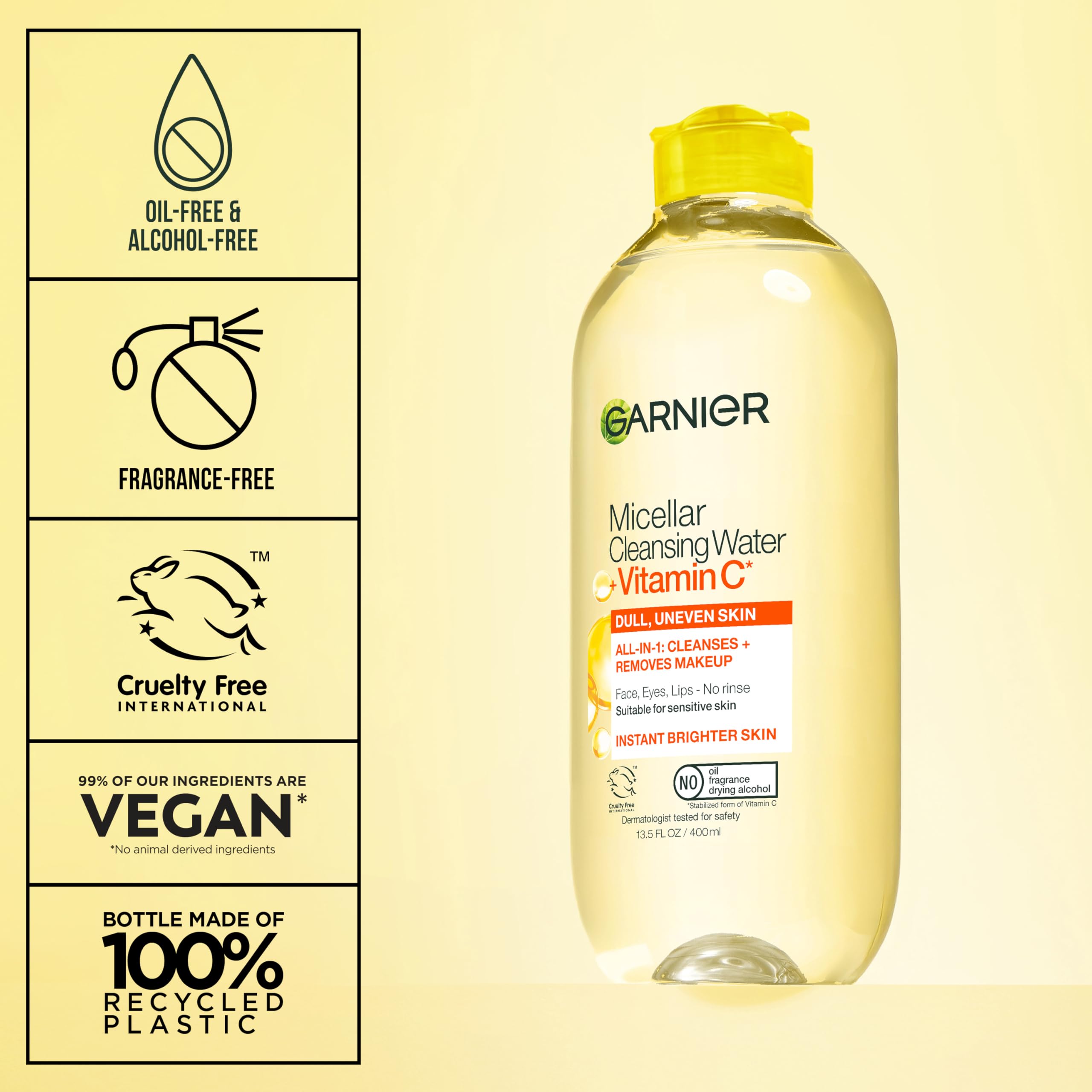 Garnier bottle next to common items to show 400 mL travel-friendly size