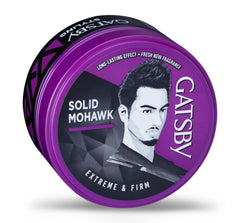 Gatsby styled mohawk on model illustrating firm hold and flexible finish