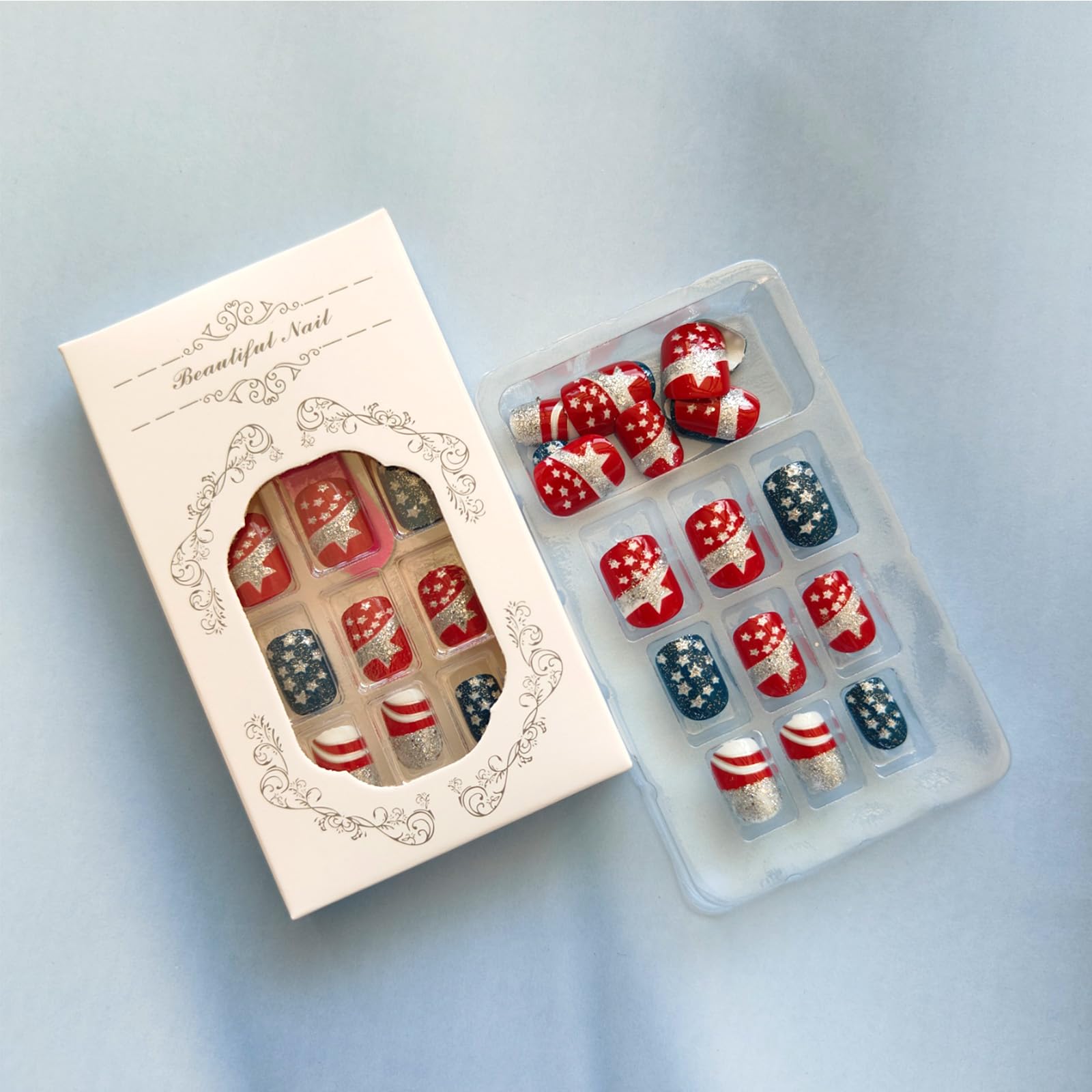 GCSQW kit contents with file cuticle stick and adhesive tabs for easy at-home application