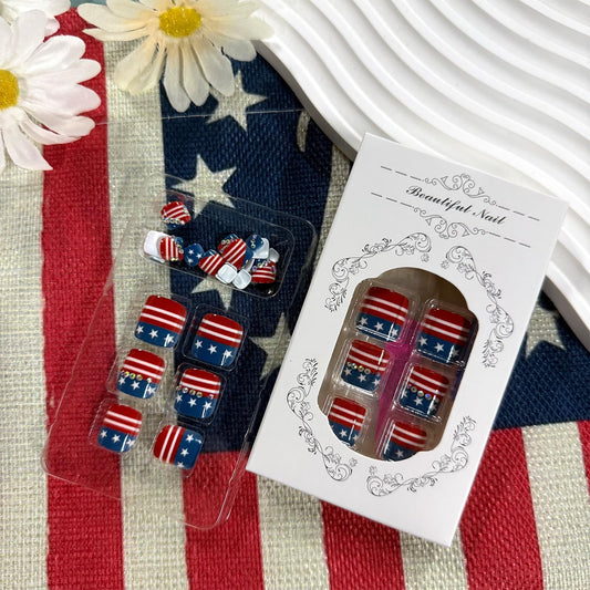 GCSQW close-up of rhinestone detail on red white blue toenail highlighting sparkle and decoration