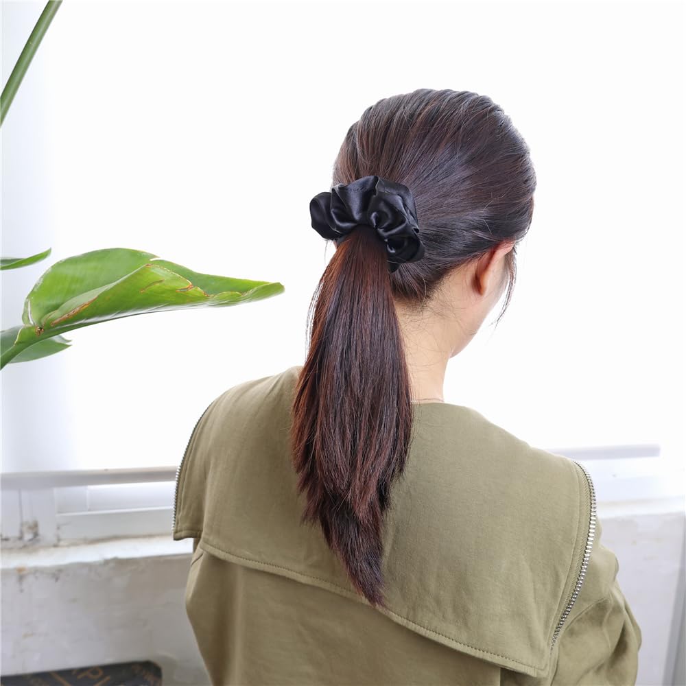 Gebelle scrunchies next to ruler showing size scale for styling decisions