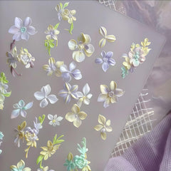 GeHaiwo demolding a cured flower charm showing flexible silicone and intact detail