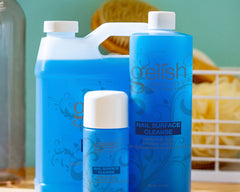 Gelish bottle staged with manicure tools in salon setting for fast professional finish
