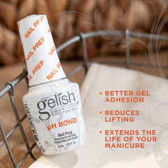 Gelish MINI pH Bond being brushed on natural nail for improved gel adhesion