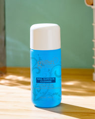 Gelish product in use wiping cured nail to remove tacky residue for high shine