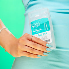 Gelish tip being applied with adhesive showing quick salon-speed benefit