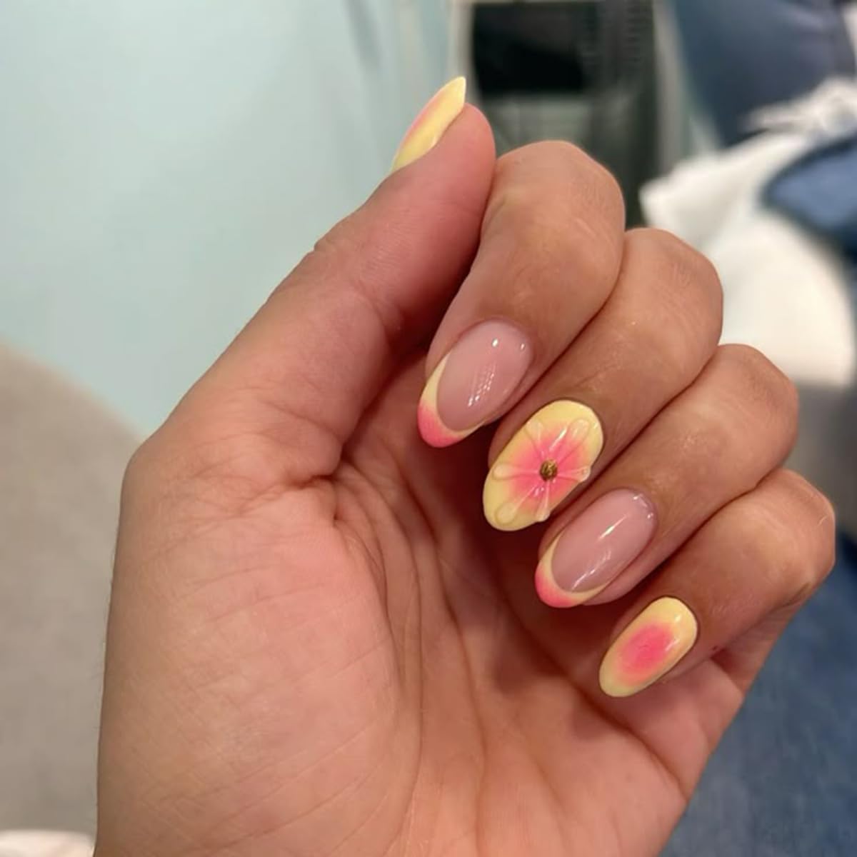 Generic brand close detail of pink French tip emphasizing clean edges and shine