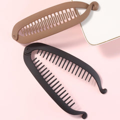 Generic banana clip used during workout keeping hair secure and neat